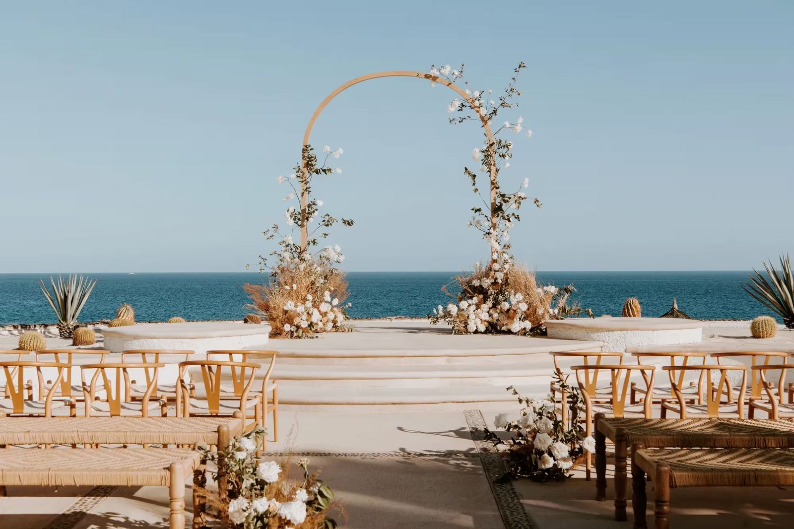 La Plaza at Las Ventanas set for a ceremony, with the Sea of Cortez behind